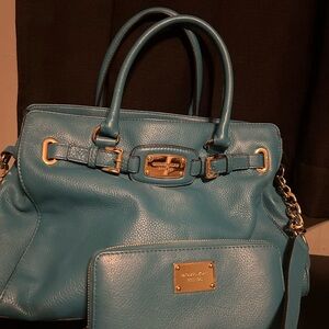 Michael Kors handbag with matching wallet.